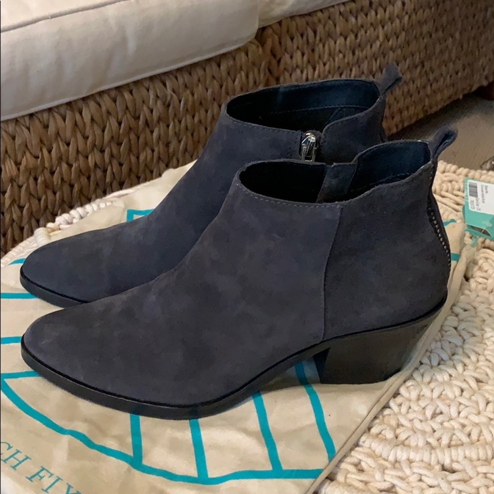 Dark gray suede boots.